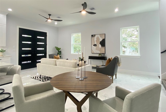 living room with ceiling fan