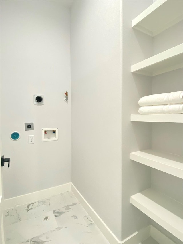 laundry room featuring gas dryer hookup, hookup for a washing machine, and hookup for an electric dryer