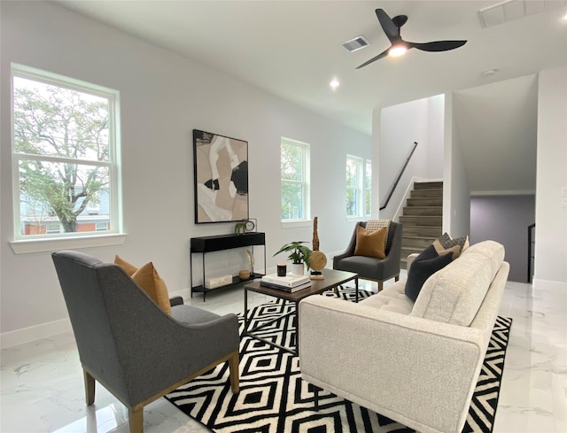 living room with ceiling fan