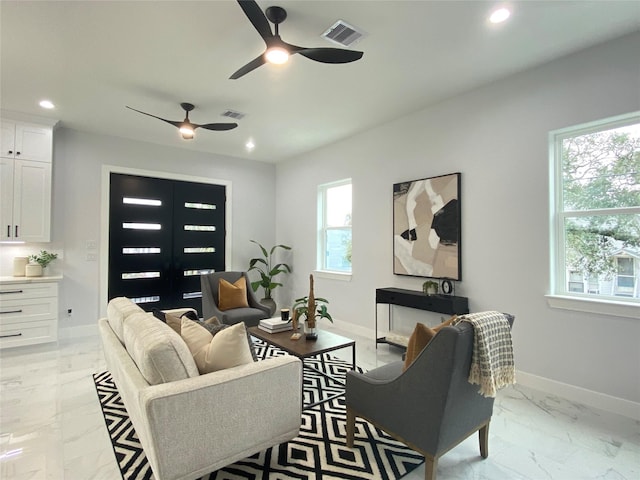 living room with ceiling fan