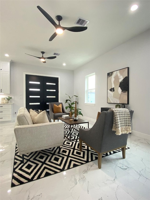 living room featuring ceiling fan