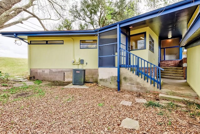 view of front of property with central AC unit