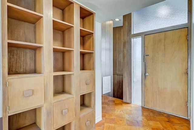 spacious closet featuring light parquet floors