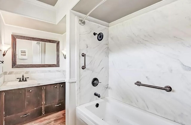 4600 Lakeshore Dr, Port Arthur, TX 77642 - bathroom with vanity, hardwood / wood-style floors, and tiled shower / bath