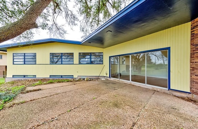 back of house featuring a patio