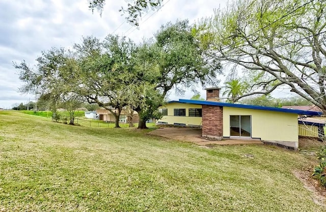 4600 Lakeshore Dr, Port Arthur, TX 77642 - view of yard with a patio area