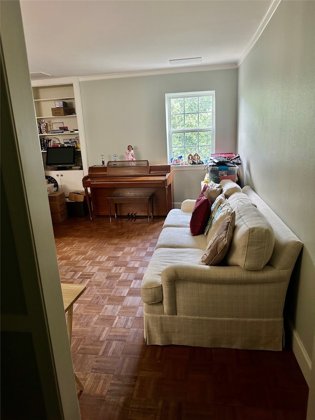 bedroom with crown molding and parquet floors