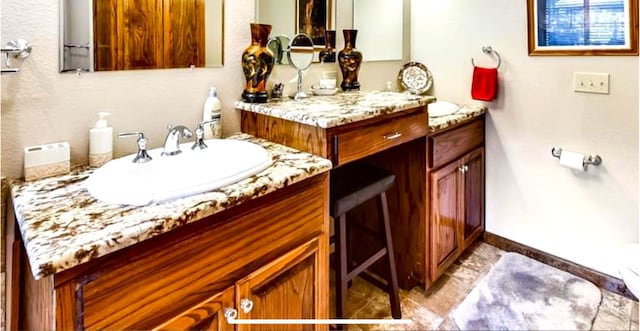 bathroom featuring tile floors and large vanity