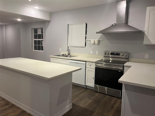 kitchen with white cabinetry, electric range, sink, wall chimney exhaust hood, and white dishwasher