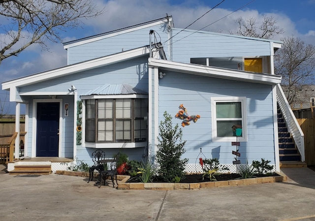 view of front of property with a patio area