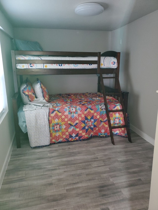 bedroom featuring hardwood / wood-style floors