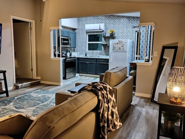 interior space featuring sink and wood-type flooring