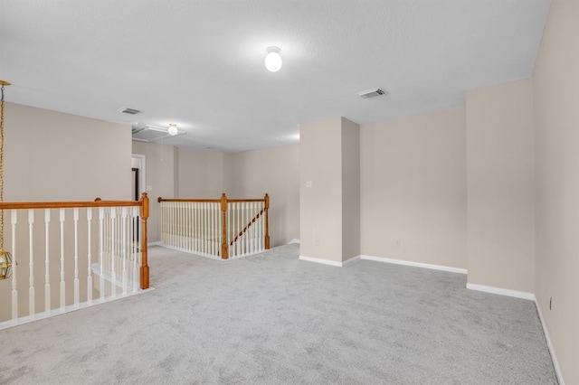 empty room featuring carpet floors