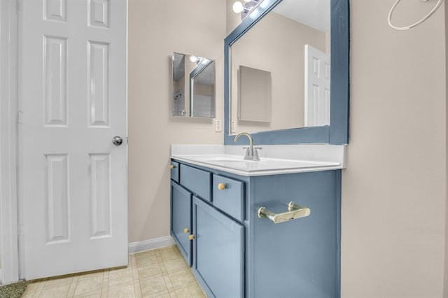 bathroom featuring tile flooring and vanity