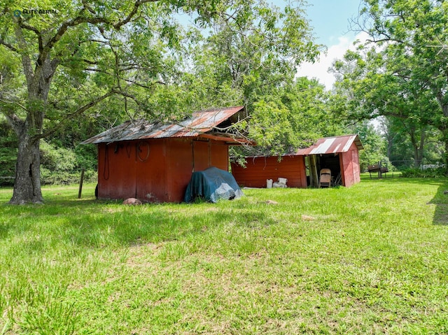 894 County Road 144, Jasper, TX 75951 - view of yard featuring an outbuilding