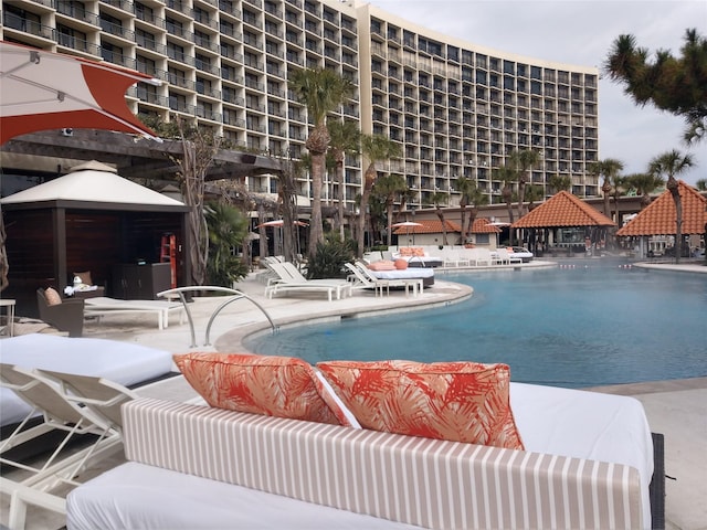 view of pool featuring a gazebo and a patio