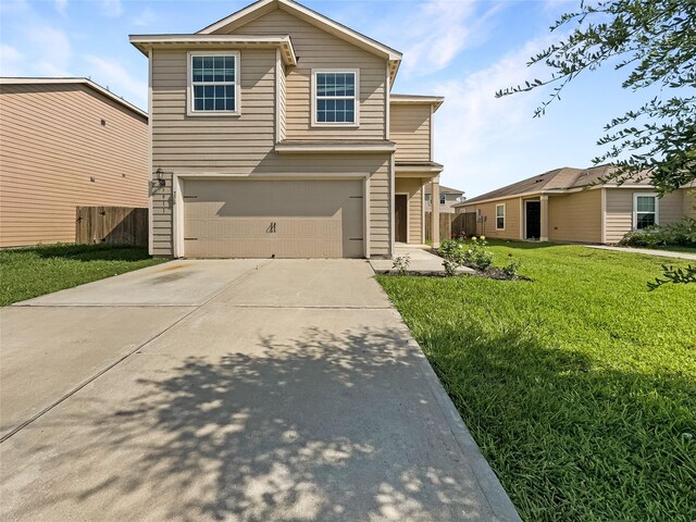 front of property with a front yard and a garage