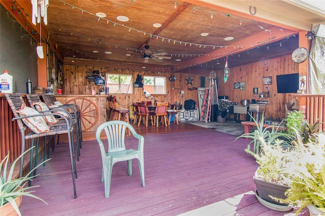 wooden terrace featuring ceiling fan