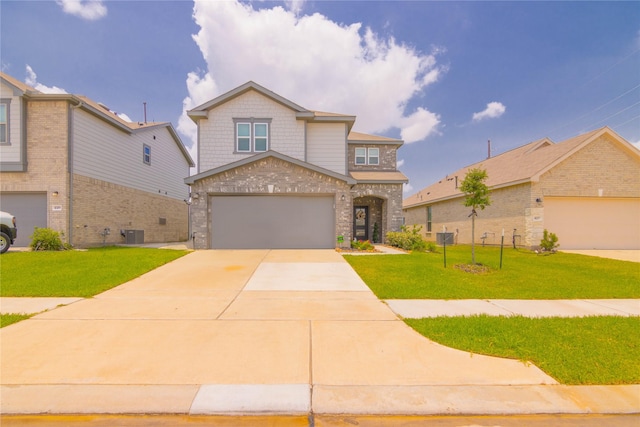 view of front of home featuring a garage, central AC unit, and a front lawn