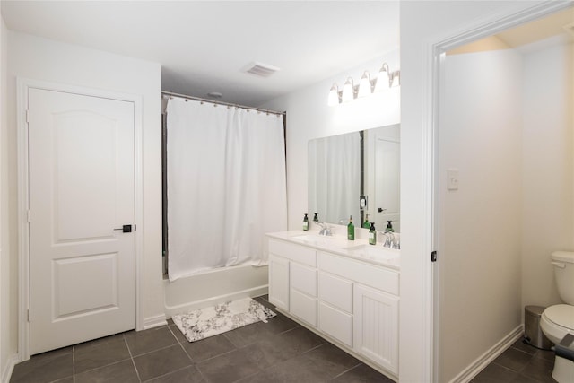 full bathroom featuring tile patterned flooring, vanity, shower / bath combination with curtain, and toilet