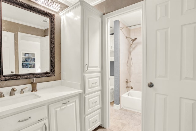 full bathroom with shower / tub combination, vanity, toilet, and crown molding