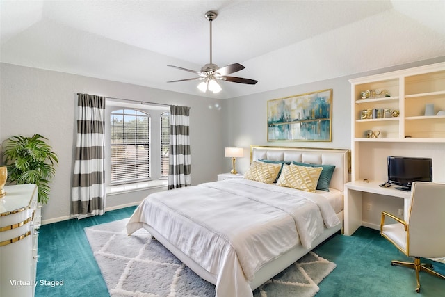 bedroom with dark colored carpet and ceiling fan