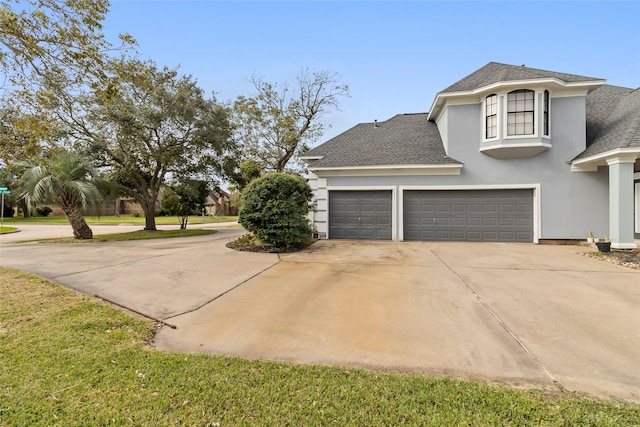 view of side of home with a garage