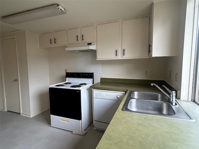 kitchen featuring white cabinets, white appliances, and sink