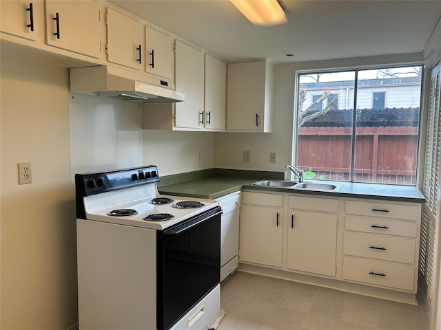 kitchen with white cabinetry, white appliances, and sink