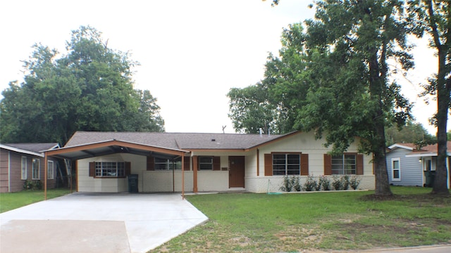 single story home featuring a front yard and a carport