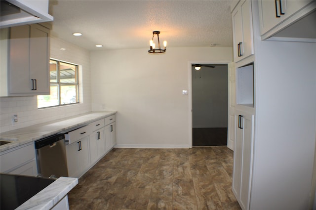 kitchen with tasteful backsplash, stainless steel dishwasher, decorative light fixtures, an inviting chandelier, and white cabinetry