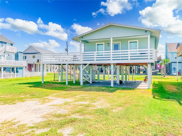 rear view of property with a yard