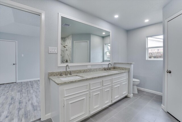 6218 Sunnygate Dr, Spring, TX 77373 - full bathroom with walk in shower, a healthy amount of sunlight, and a sink