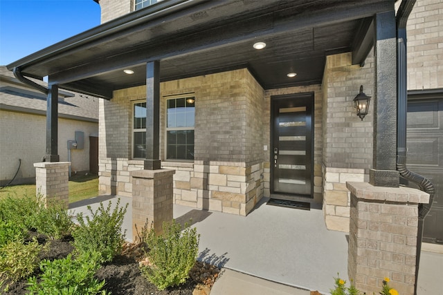 entrance to property with covered porch