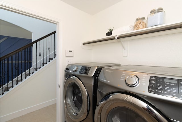 laundry room featuring washing machine and dryer