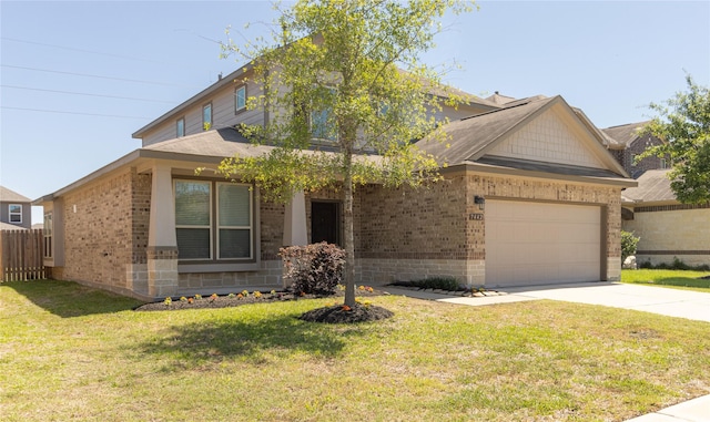 view of front of home with a garage and a front lawn