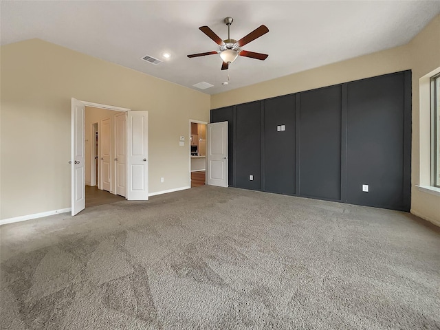 unfurnished bedroom featuring carpet flooring and ceiling fan