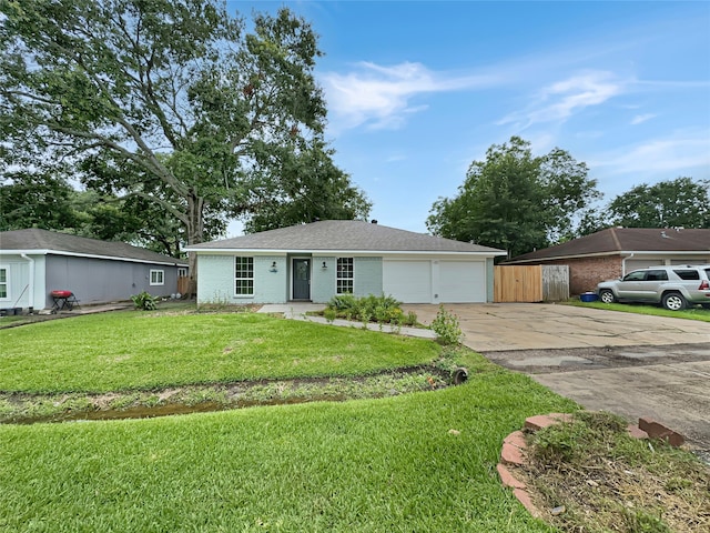 ranch-style home with a front lawn