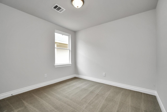 spare room with carpet flooring