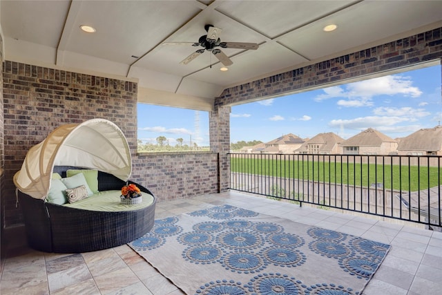 view of patio featuring ceiling fan