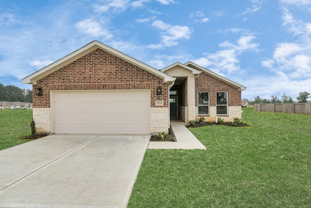 view of front of home with a front lawn and a garage