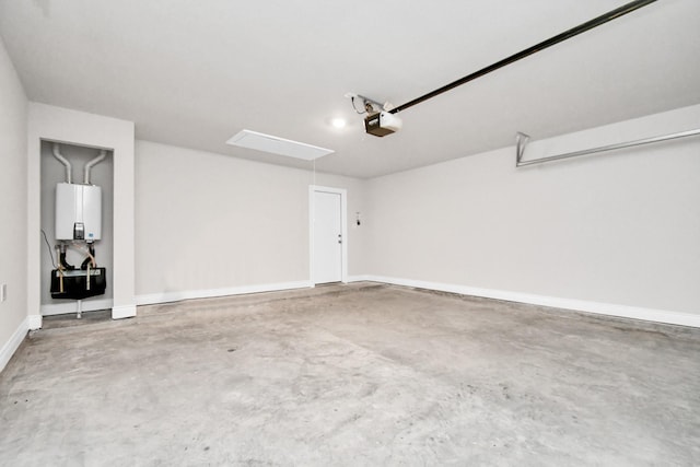 garage featuring tankless water heater and a garage door opener