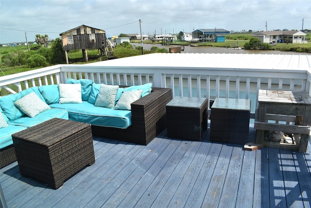 wooden deck with an outdoor hangout area