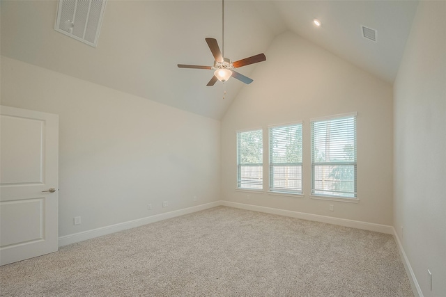 unfurnished room featuring light carpet, high vaulted ceiling, and ceiling fan