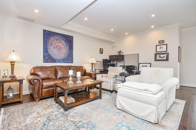 living room featuring hardwood / wood-style floors and ornamental molding