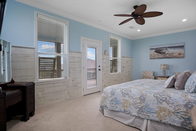 bedroom with ornamental molding, access to exterior, ceiling fan, and light colored carpet