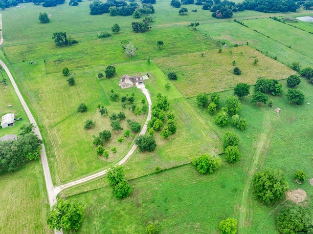 birds eye view of property featuring a rural view