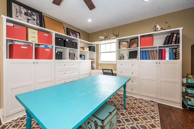 office area featuring dark wood-type flooring and ceiling fan