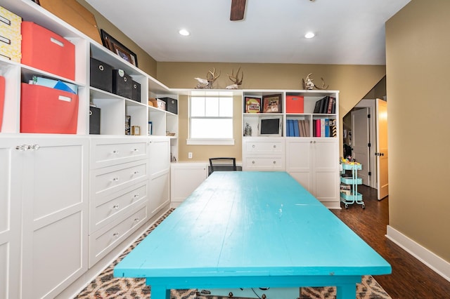 rec room with dark hardwood / wood-style flooring and ceiling fan