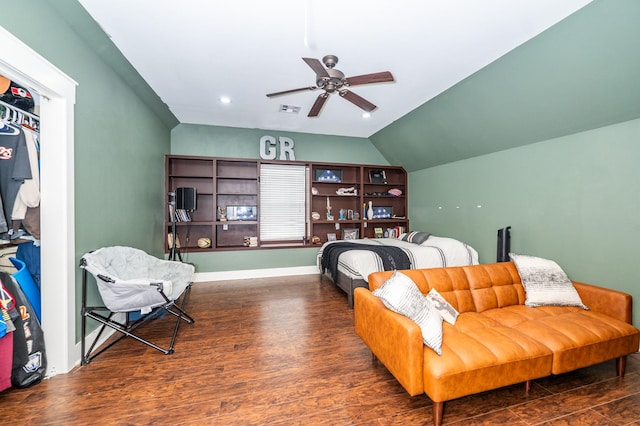 bedroom featuring ceiling fan, lofted ceiling, and dark hardwood / wood-style floors